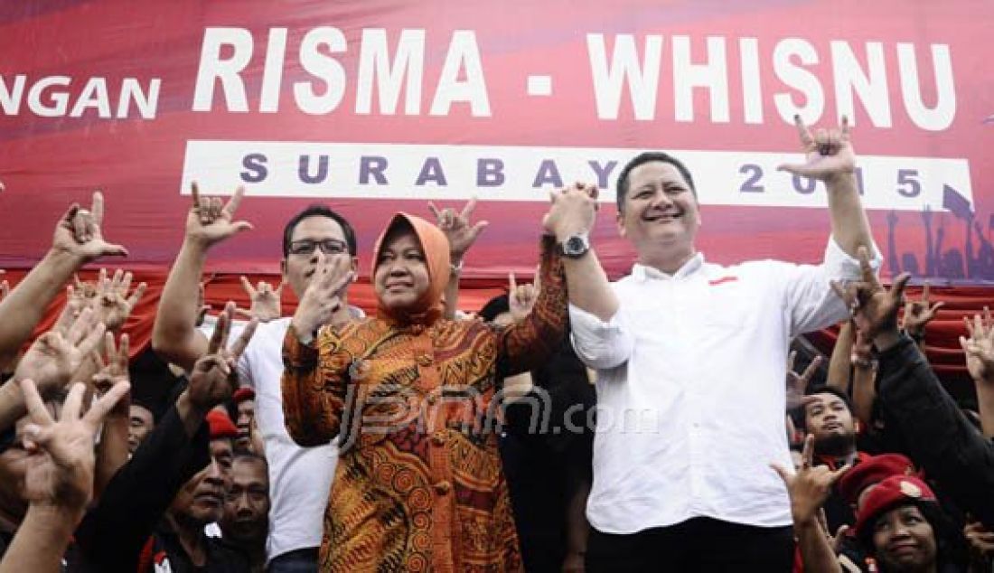 Pasangan Risma-Whisnu kembali terpilih jadi walikota dan wakil walikota Surabaya. Foto: Triyoko/Memorandum - JPNN.com