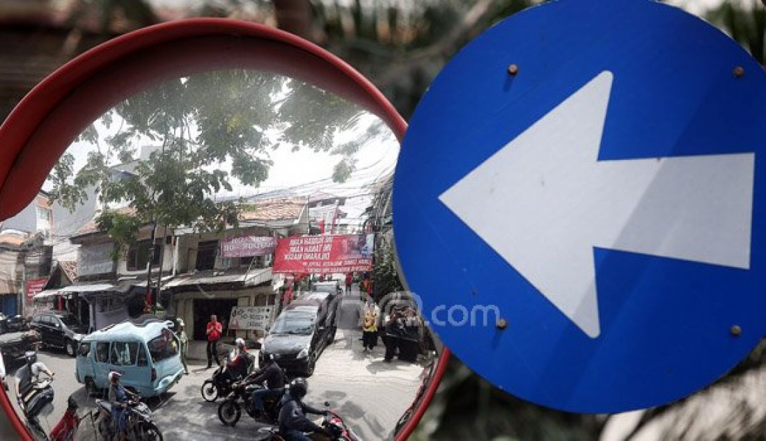 Spanduk penolakan bertebaran di Jalan Mangga Besar 1 RW 02 Kelurahan Mangga Besar, Tamansari, Jakarta Barat, Senin (22/8). Warga menolak rencana penggusuran kampung mereka. Foto: Ricardo/JPNN.com - JPNN.com