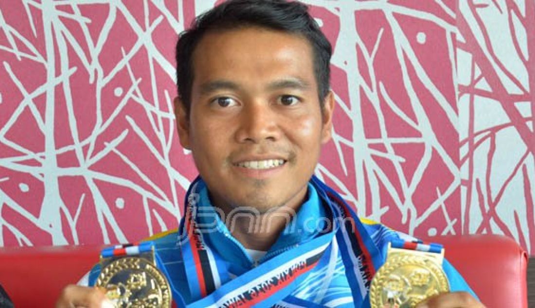 Eko Irawan, atlet Perpani asal Jambi yang Meraih Emas pada PON XIX Jabar 2016. Foto: M Ridwan/Jambi Ekspres - JPNN.com