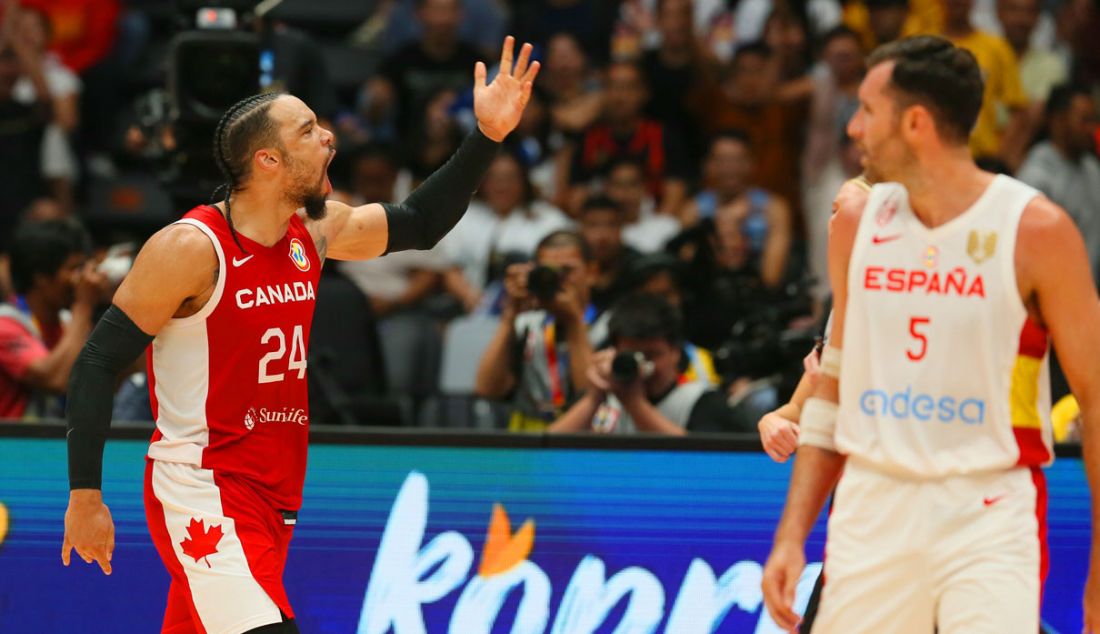 Pebasket Kanada Dillon Brooks meluapkan kegembiraannya seusai mencetak tiga angka ke ring basket Spanyol pada putaran kedua Grup L FIBA World Cup 2023 di Indonesia Arena, Gelora Bung Karno, Senayan, Jakarta, Minggu (3/9). Kanada berhasil mengalahkan Spanyol dengan skor 88-85. - JPNN.com