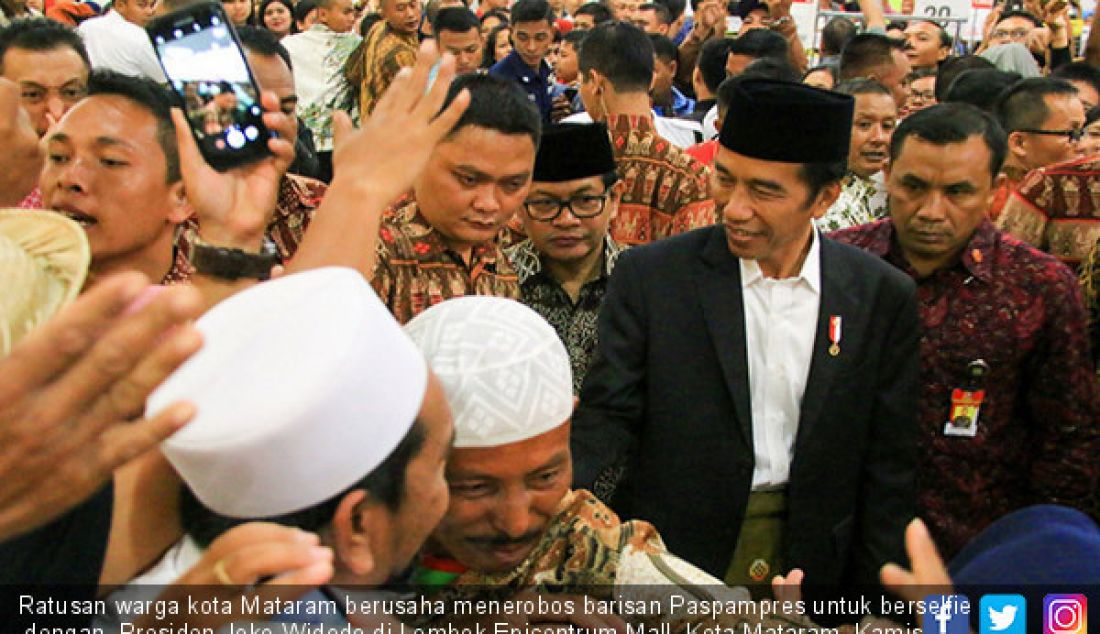 Ratusan warga kota Mataram berusaha menerobos barisan Paspampres untuk berselfie dengan Presiden Joko Widodo di Lombok Epicentrum Mall, Kota Mataram, Kamis (19/10). - JPNN.com