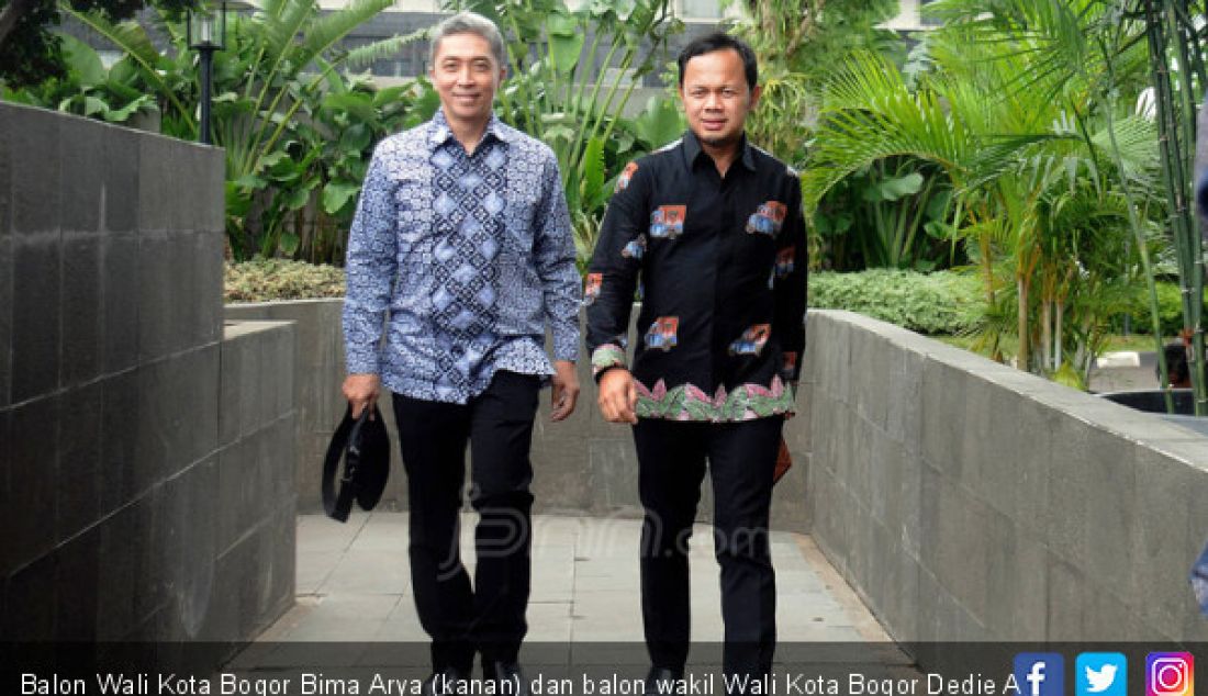 Balon Wali Kota Bogor Bima Arya (kanan) dan balon wakil Wali Kota Bogor Dedie A Rachmi mendatangi gedung KPK Jakarta, Jumat (19/1). - JPNN.com