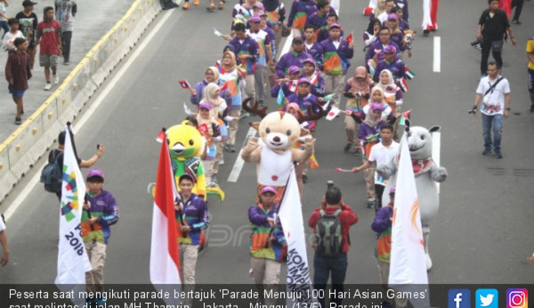 Peserta saat mengikuti parade bertajuk 'Parade Menuju 100 Hari Asian Games' saat melintas di jalan MH Thamrin, Jakarta, Minggu (13/5). Parade ini diselenggarakan untuk menyemarakkan perhelatan Asian Games yang akan dibuka 18 Agustus 2018. - JPNN.com