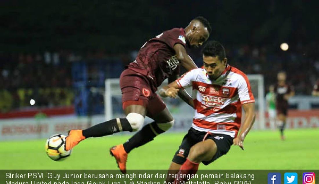Striker PSM, Guy Junior berusaha menghindar dari terjangan pemain belakang Madura United pada laga Gojek Liga 1 di Stadion Andi Mattalatta, Rabu (30/5). - JPNN.com