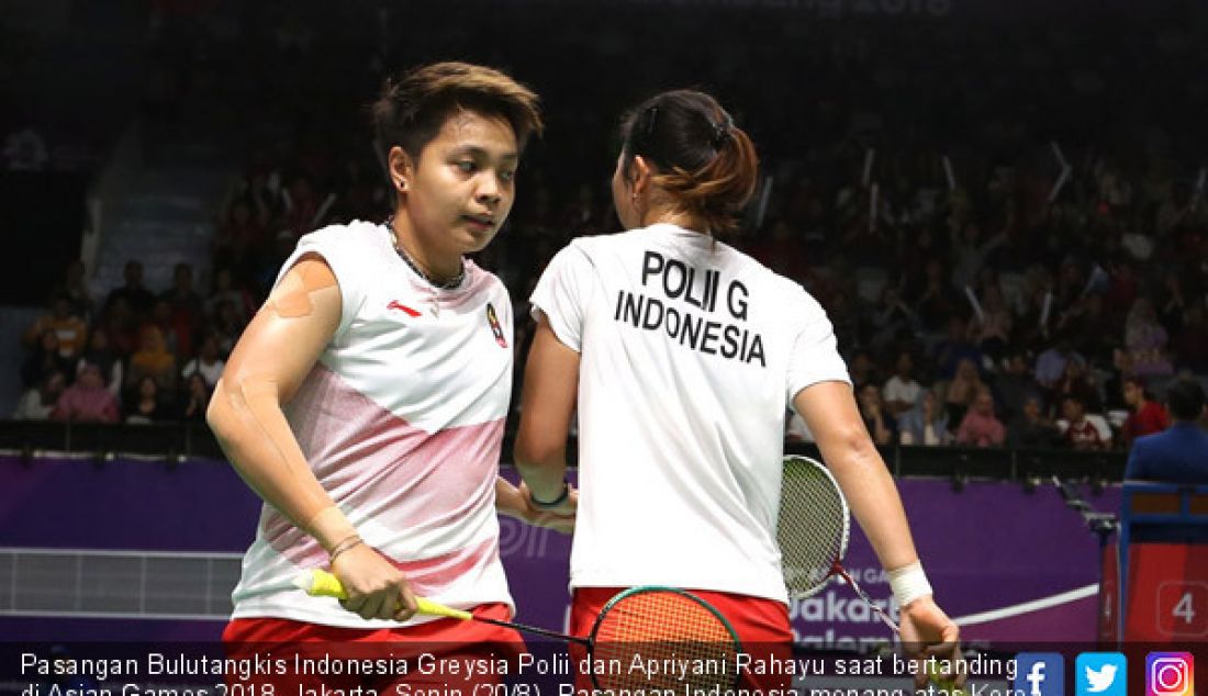 Pasangan Bulutangkis Indonesia Greysia Polii dan Apriyani Rahayu saat bertanding di Asian Games 2018, Jakarta, Senin (20/8). Pasangan Indonesia menang atas Korea Selatan. - JPNN.com