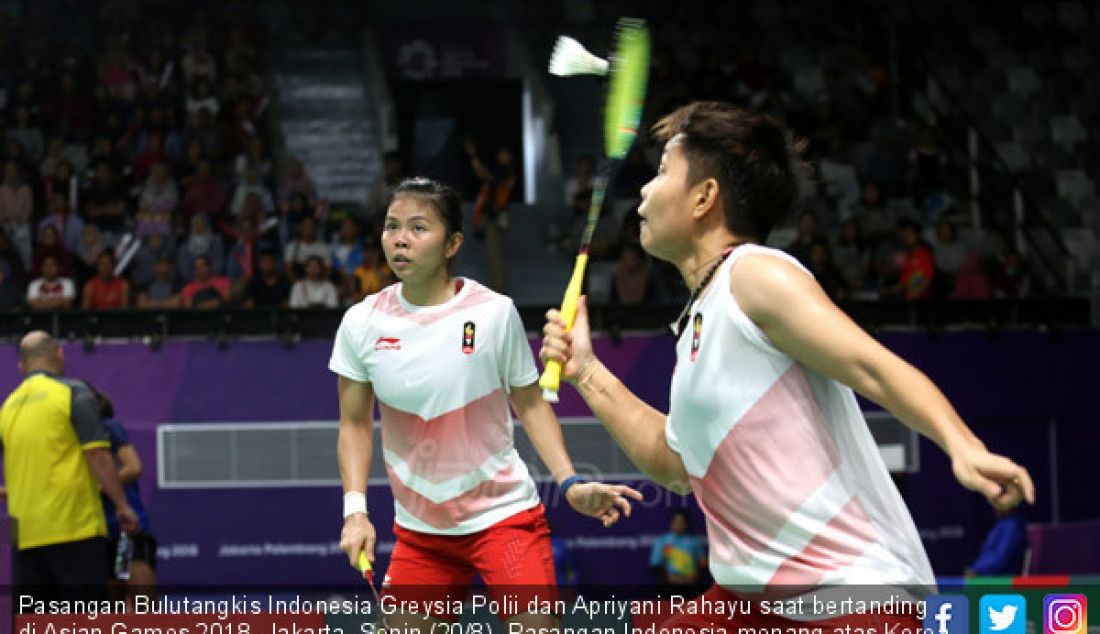 Pasangan Bulutangkis Indonesia Greysia Polii dan Apriyani Rahayu saat bertanding di Asian Games 2018, Jakarta, Senin (20/8). Pasangan Indonesia menang atas Korea Selatan. - JPNN.com