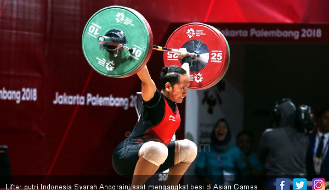 Lifter putri Indonesia Syarah Anggraini saat mengangkat besi di Asian Games 2018, Jakarta, Selasa (21/8). - JPNN.com