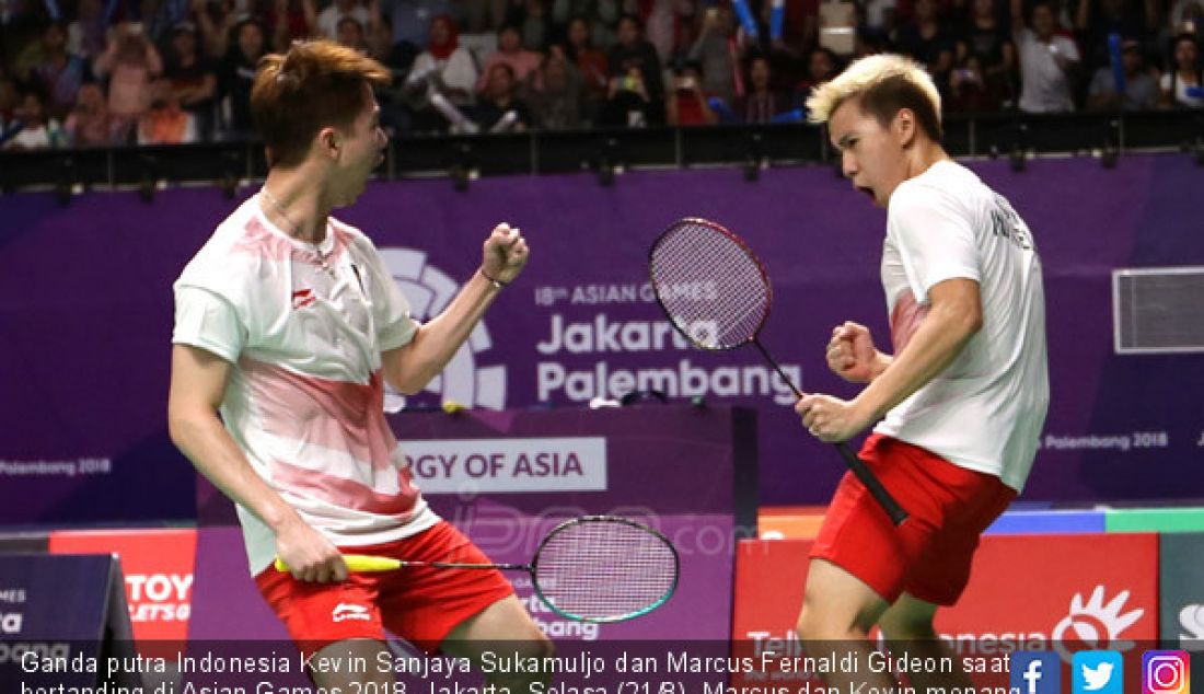 Ganda putra Indonesia Kevin Sanjaya Sukamuljo dan Marcus Fernaldi Gideon saat bertanding di Asian Games 2018, Jakarta, Selasa (21/8). Marcus dan Kevin menang atas ganda putra Jepang dengan dua set langsung. - JPNN.com