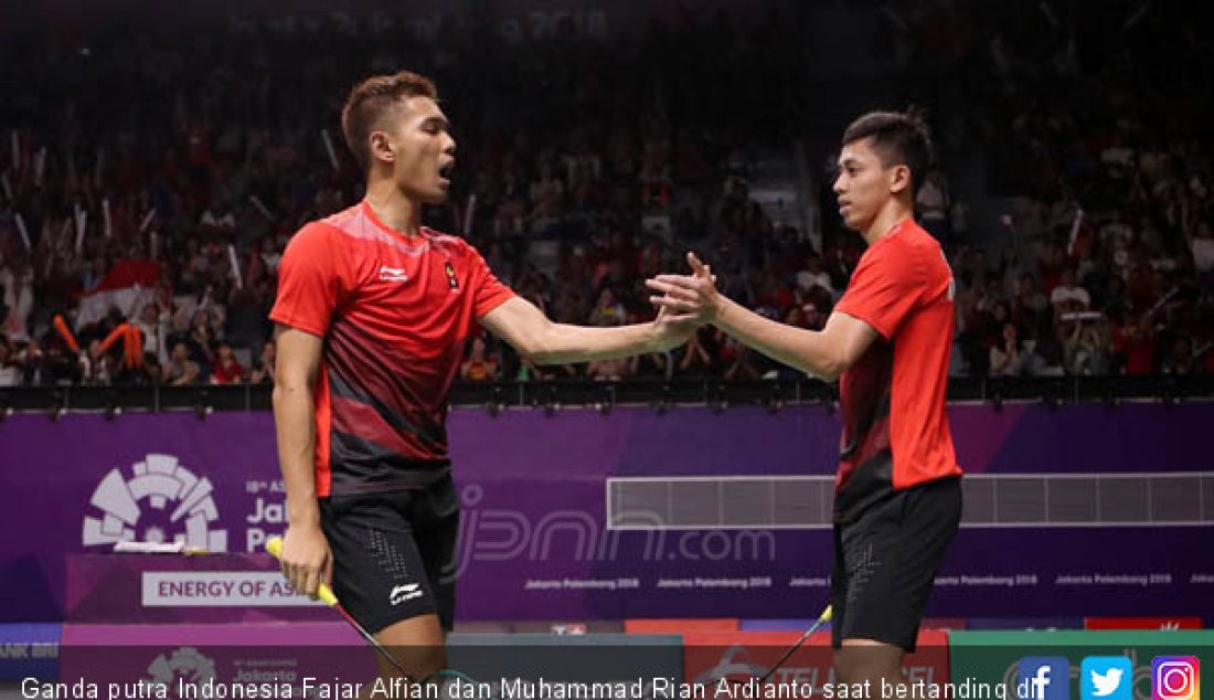 Ganda putra Indonesia Fajar Alfian dan Muhammad Rian Ardianto saat bertanding di Asian Games 2018, Jakarta, Minggu (26/8). - JPNN.com