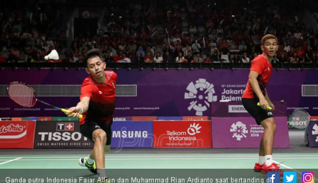 Ganda putra Indonesia Fajar Alfian dan Muhammad Rian Ardianto saat bertanding di Asian Games 2018, Jakarta, Minggu (26/8). - JPNN.com