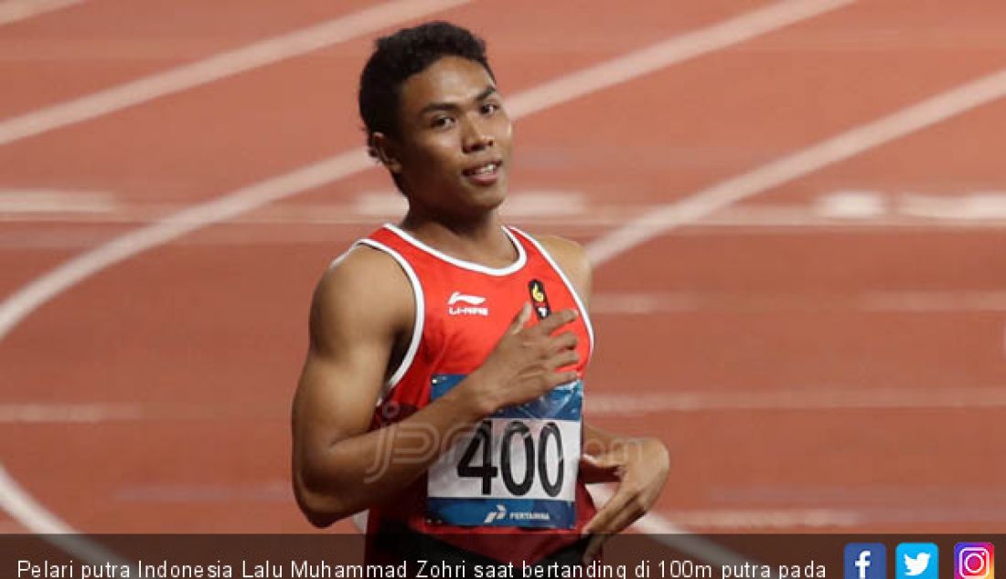 Pelari putra Indonesia Lalu Muhammad Zohri saat bertanding di 100m putra pada Asian Games 2018, Jakarta, Minggu (26/8). - JPNN.com