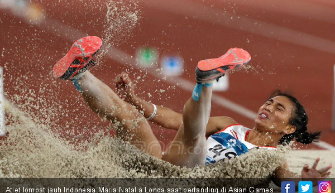 Atlet lompat jauh Indonesia Maria Natalia Londa saat bertanding di Asian Games 2018, Jakarta, Senin (27/8). - JPNN.com