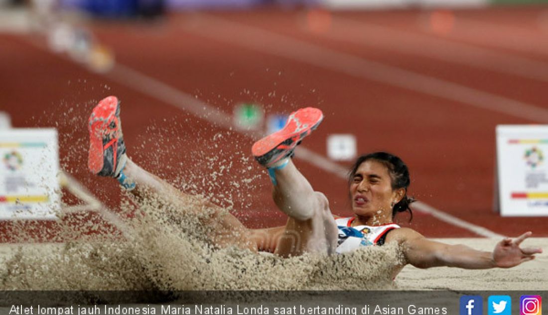 Atlet lompat jauh Indonesia Maria Natalia Londa saat bertanding di Asian Games 2018, Jakarta, Senin (27/8). - JPNN.com