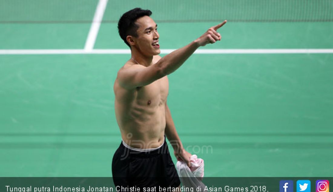 Tunggal putra Indonesia Jonatan Christie saat bertanding di Asian Games 2018, Jakarta, Selasa (28/8). Jonatan meraih medali emas. - JPNN.com