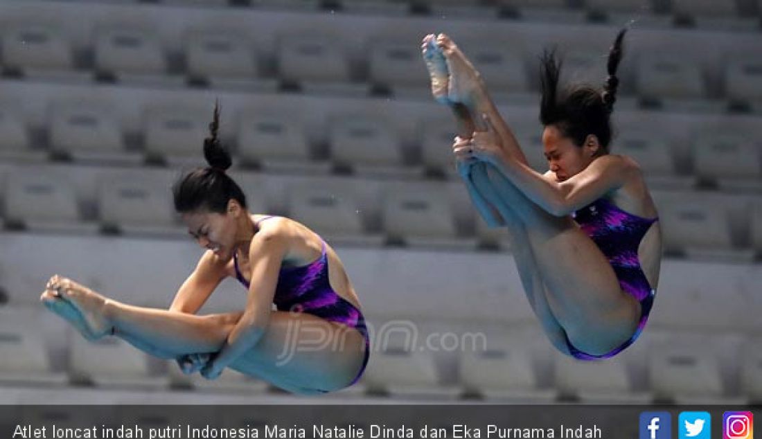 Atlet loncat indah putri Indonesia Maria Natalie Dinda dan Eka Purnama Indah saat bertanding di Asian Games 2018, Jakarta, Rabu (29/8). - JPNN.com