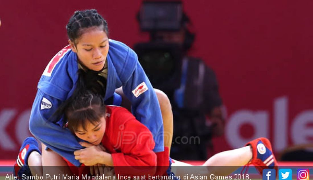 Atlet Sambo Putri Maria Magdalena Ince saat bertanding di Asian Games 2018, Jakarta, Jumat (31/8). - JPNN.com