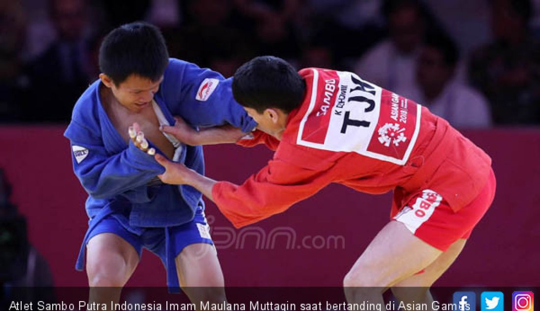 Atlet Sambo Putra Indonesia Imam Maulana Muttaqin saat bertanding di Asian Games 2018, Jakarta, Jumat (31/8). - JPNN.com