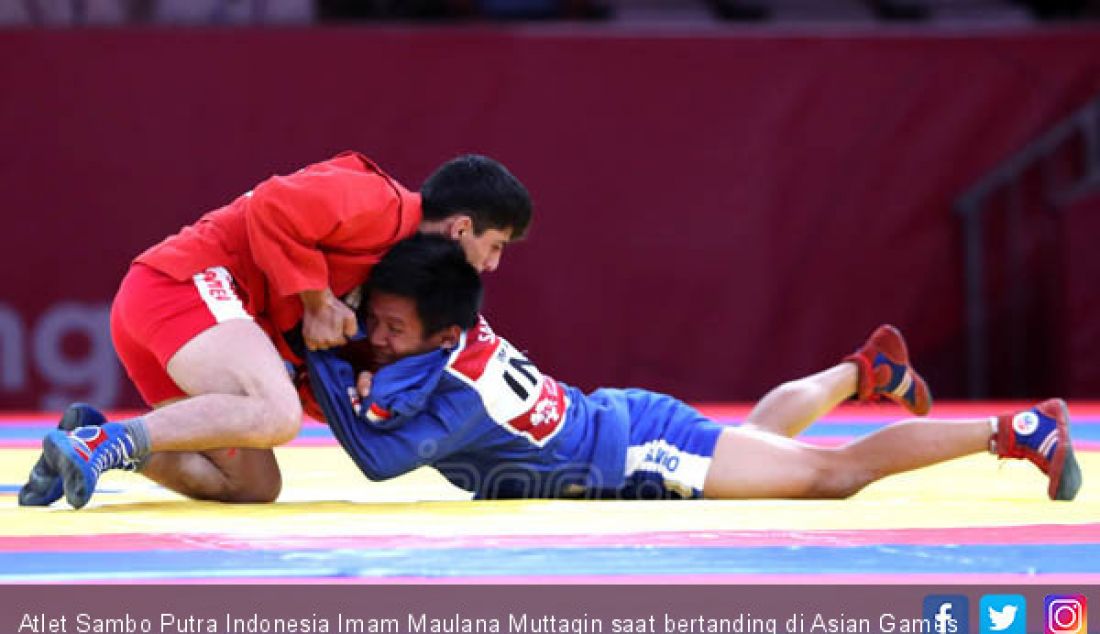 Atlet Sambo Putra Indonesia Imam Maulana Muttaqin saat bertanding di Asian Games 2018, Jakarta, Jumat (31/8). - JPNN.com