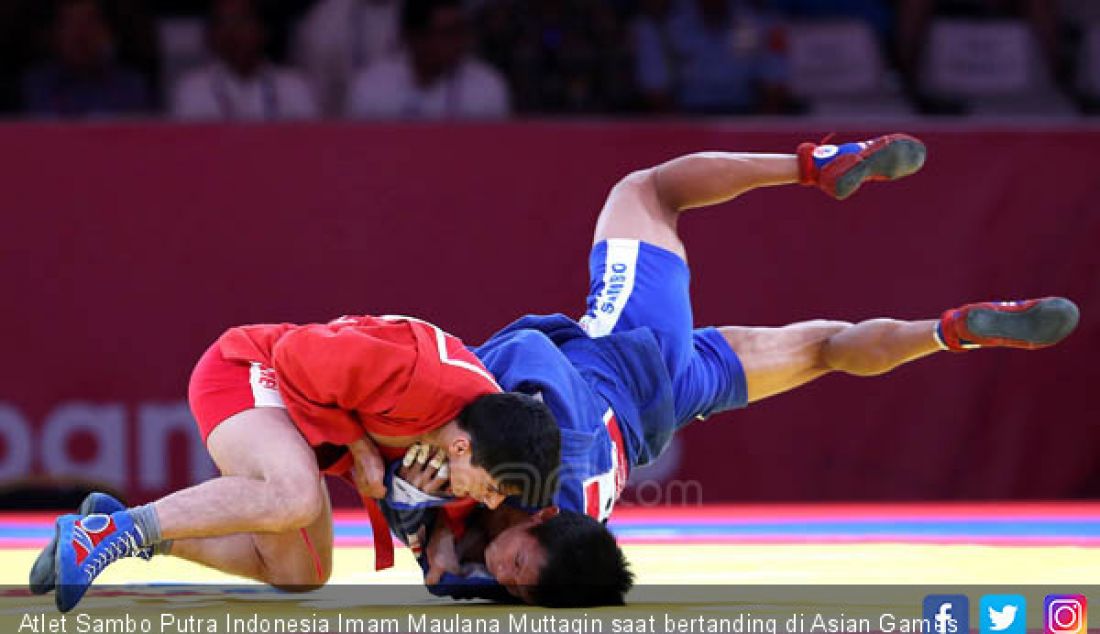 Atlet Sambo Putra Indonesia Imam Maulana Muttaqin saat bertanding di Asian Games 2018, Jakarta, Jumat (31/8). - JPNN.com