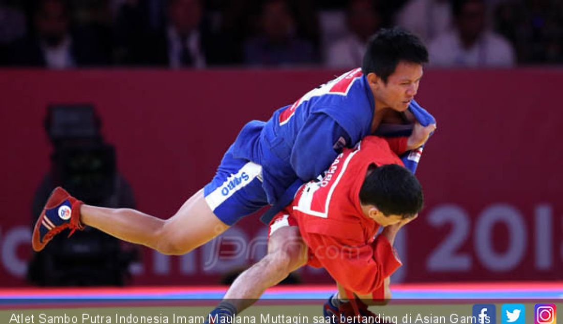 Atlet Sambo Putra Indonesia Imam Maulana Muttaqin saat bertanding di Asian Games 2018, Jakarta, Jumat (31/8). - JPNN.com