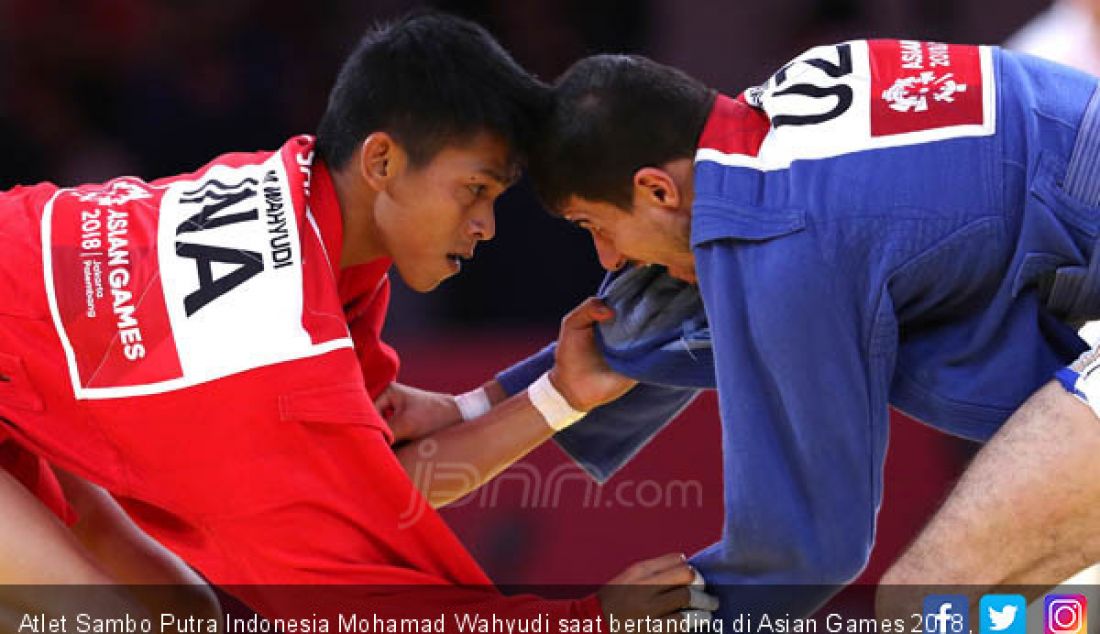 Atlet Sambo Putra Indonesia Mohamad Wahyudi saat bertanding di Asian Games 2018, Jakarta, Jumat (31/8). - JPNN.com