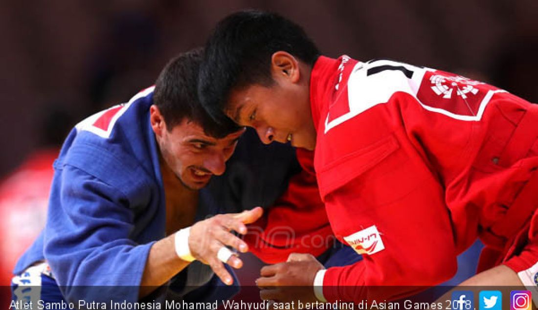 Atlet Sambo Putra Indonesia Mohamad Wahyudi saat bertanding di Asian Games 2018, Jakarta, Jumat (31/8). - JPNN.com