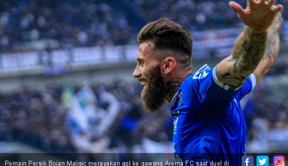 Pemain Persib Bojan Malisic merayakan gol ke gawang Arema FC saat duel di Stadion GBLA, Kamis (13/9). - JPNN.com