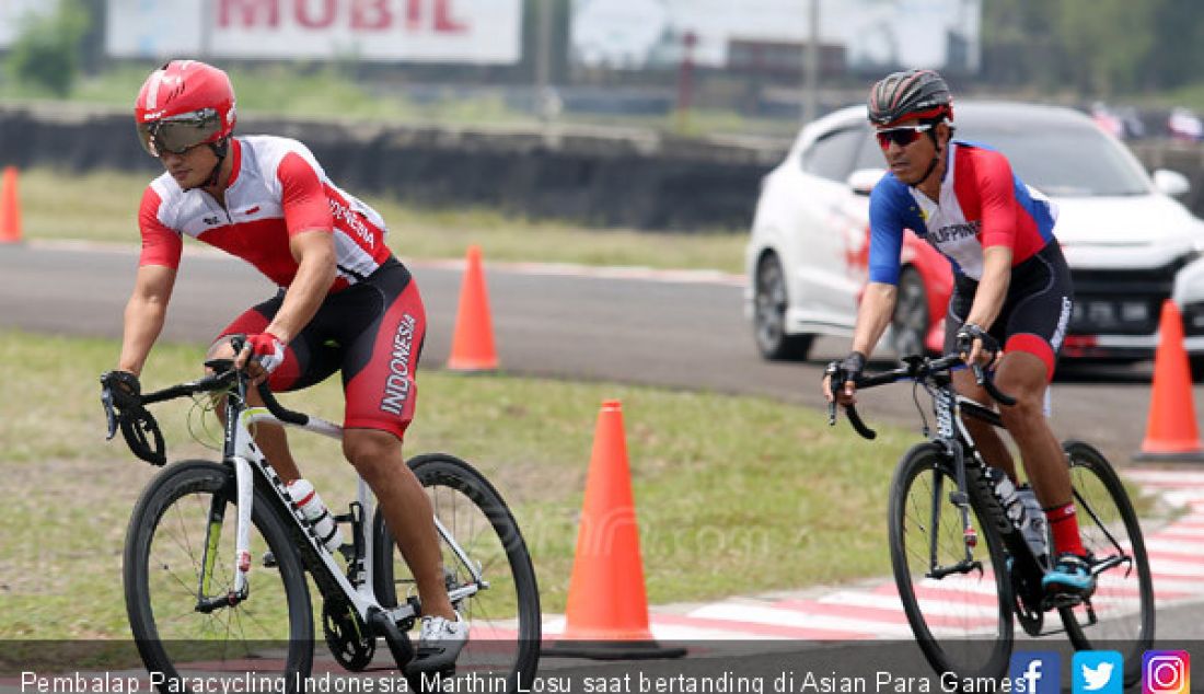 Pembalap Paracycling Indonesia Marthin Losu saat bertanding di Asian Para Games 2018, Bogor, Selasa (9/10). - JPNN.com