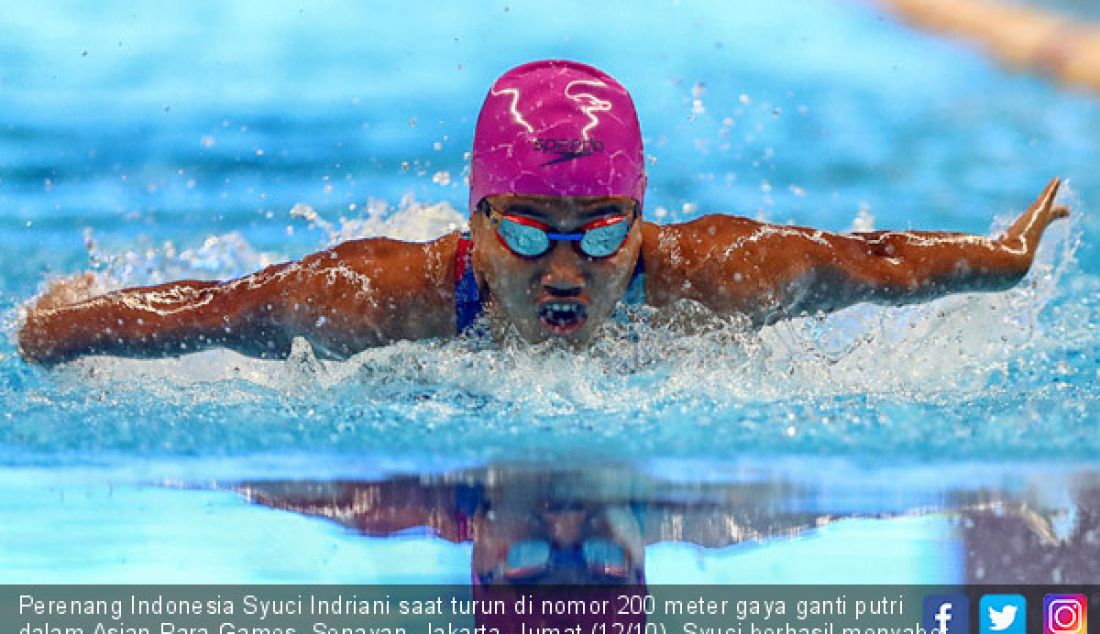 Perenang Indonesia Syuci Indriani saat turun di nomor 200 meter gaya ganti putri dalam Asian Para Games, Senayan, Jakarta, Jumat (12/10). Syuci berhasil menyabet medali emas 2 menit 36,32 detik. - JPNN.com