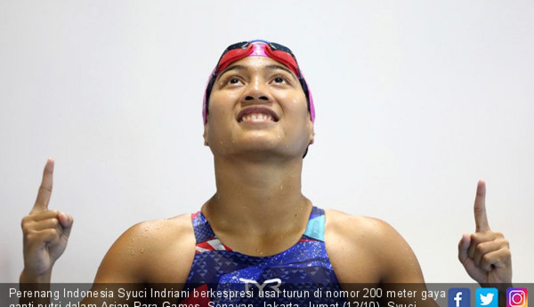 Perenang Indonesia Syuci Indriani berkespresi usai turun di nomor 200 meter gaya ganti putri dalam Asian Para Games, Senayan, Jakarta, Jumat (12/10). Syuci berhasil menyabet medali emas 2 menit 36,32 detik. - JPNN.com