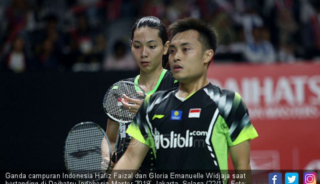 Ganda campuran Indonesia Hafiz Faizal dan Gloria Emanuelle Widjaja saat bertanding di Daihatsu Indonesia Master 2019, Jakarta, Selasa (22/1). - JPNN.com