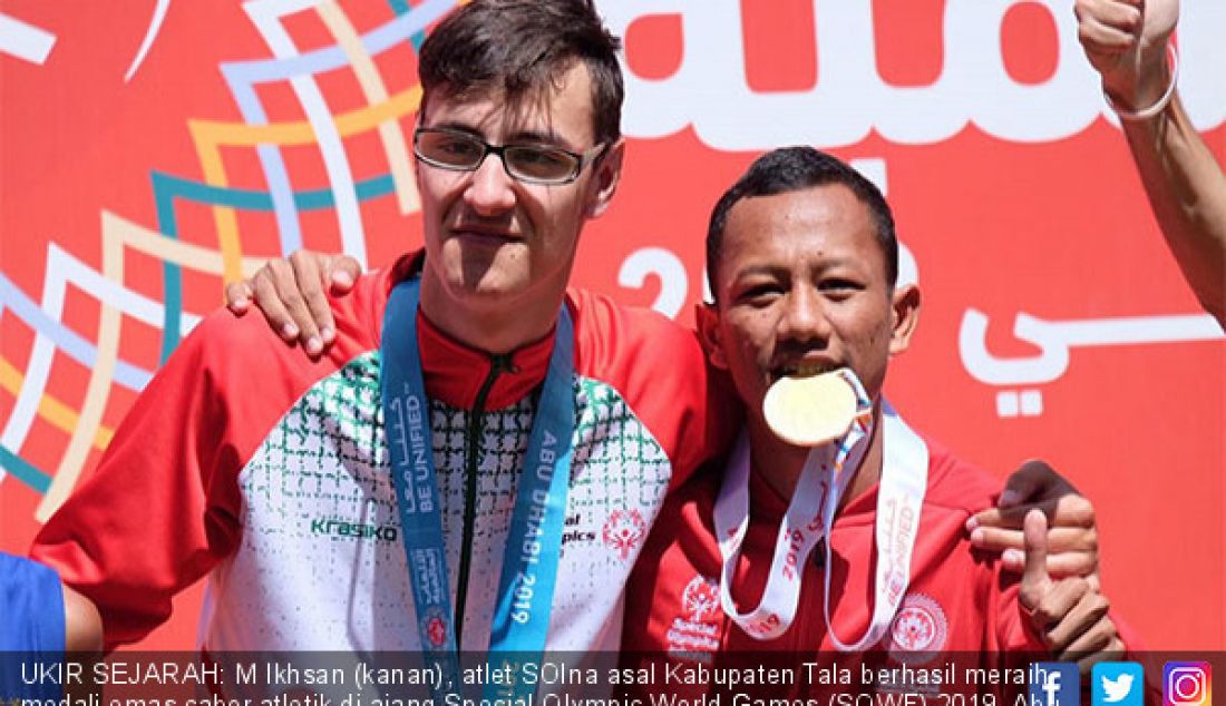 UKIR SEJARAH: M Ikhsan (kanan), atlet SOIna asal Kabupaten Tala berhasil meraih medali emas cabor atletik di ajang Special Olympic World Games (SOWF) 2019, Abu Dhabi. - JPNN.com