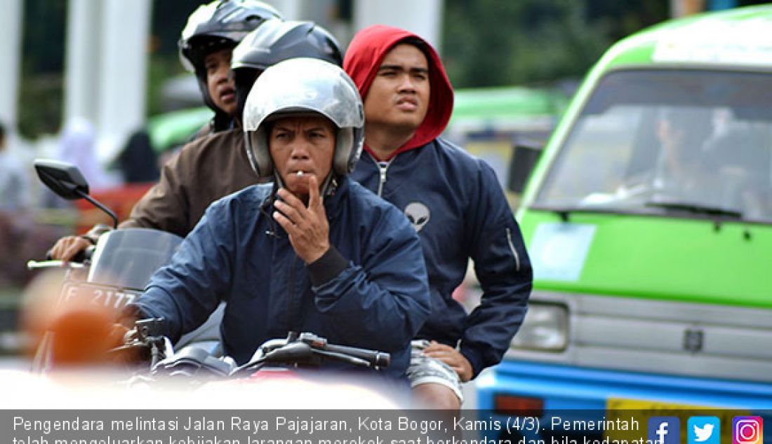 Pengendara melintasi Jalan Raya Pajajaran, Kota Bogor, Kamis (4/3). Pemerintah telah mengeluarkan kebijakan larangan merokok saat berkendara dan bila kedapatan merokok akan denda Rp750 ribu. - JPNN.com