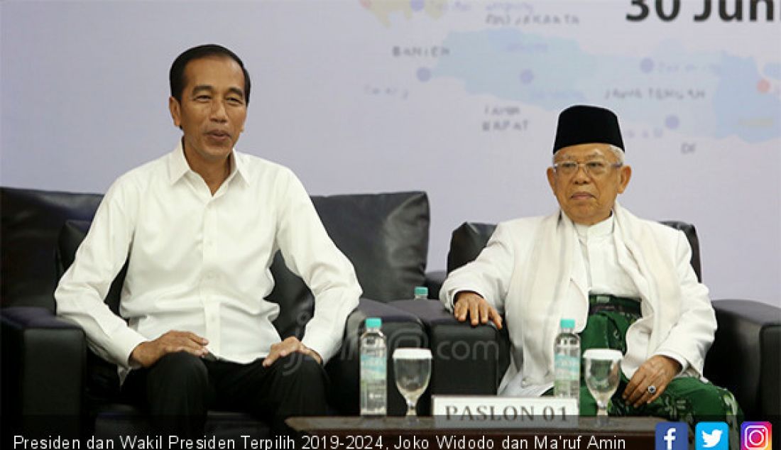 Presiden dan Wakil Presiden Terpilih 2019-2024, Joko Widodo dan Ma'ruf Amin menghadiri penetapan di kantor KPU, Jakarta, Minggu (30/6) - JPNN.com