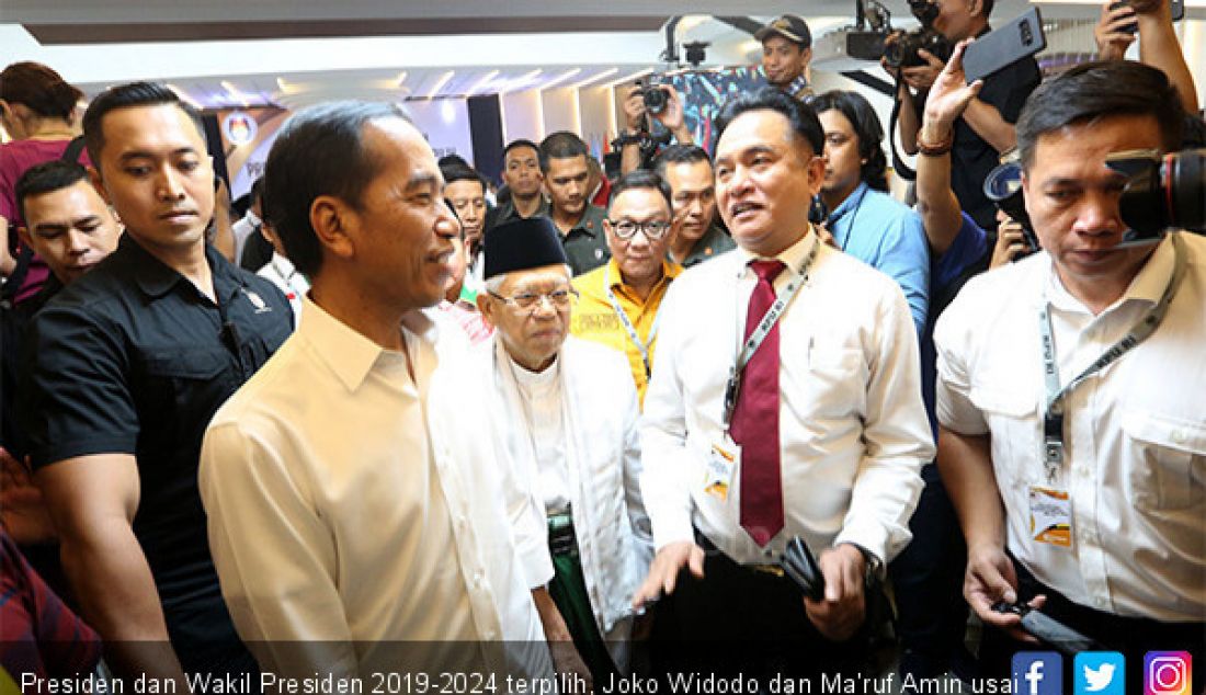 Presiden dan Wakil Presiden 2019-2024 terpilih, Joko Widodo dan Ma'ruf Amin usai acara penetapan di kantor KPU, Jakarta, Minggu (30/6). - JPNN.com