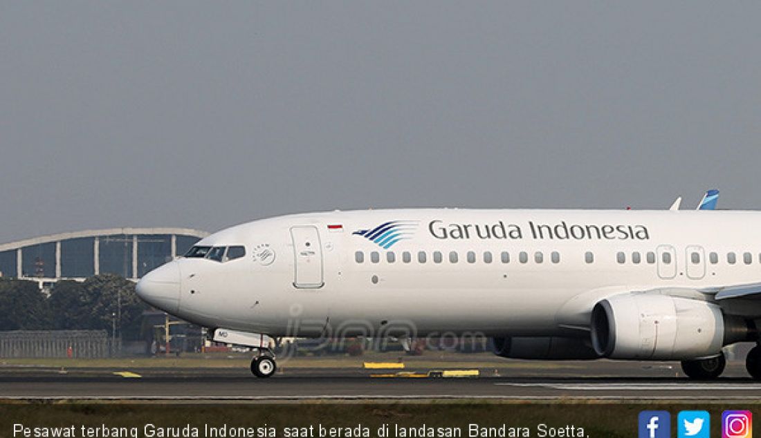 Pesawat terbang Garuda Indonesia saat berada di landasan Bandara Soetta, Tangerang, Banten. - JPNN.com