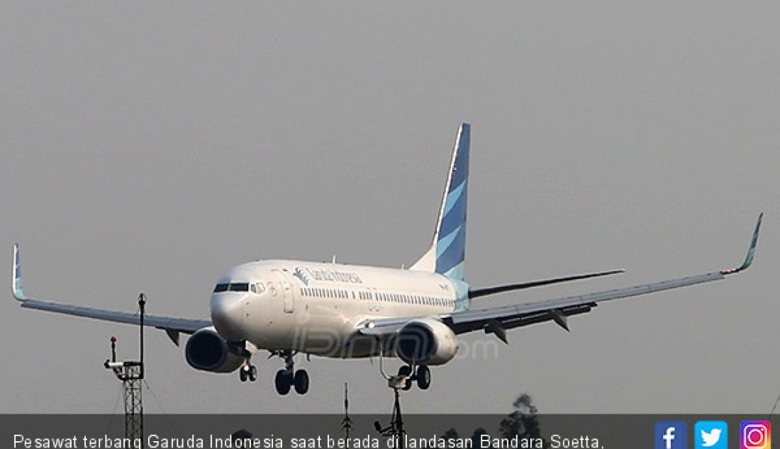 Pesawat terbang Garuda Indonesia saat berada di landasan Bandara Soetta, Tangerang, Banten. - JPNN.com