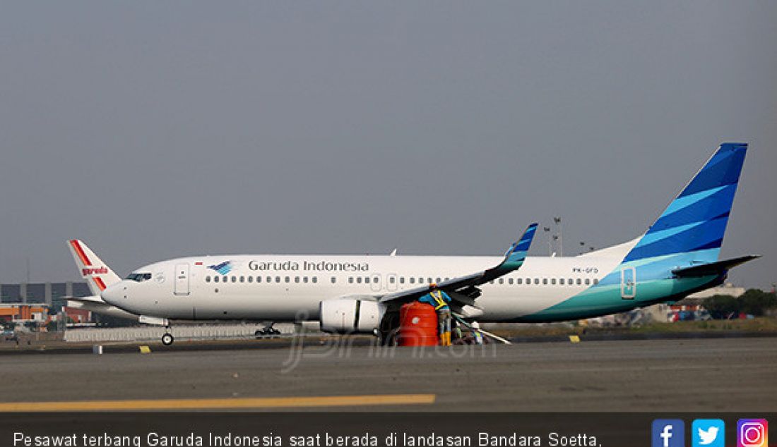 Pesawat terbang Garuda Indonesia saat berada di landasan Bandara Soetta, Tangerang, Banten. - JPNN.com