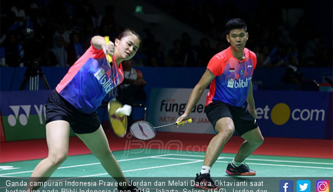 Ganda campuran Indonesia Praveen Jordan dan Melati Daeva Oktavianti saat bertanding pada Blibli Indonesia Open 2019, Jakarta, Selasa (16/7). Jordan dan Oktavianti kalah atas lawannya ganda campuran Jerman 20-22 dan 14-21. - JPNN.com