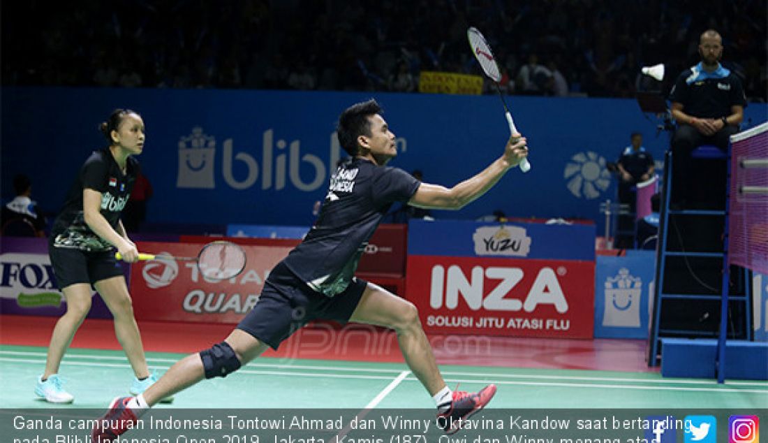 Ganda campuran Indonesia Tontowi Ahmad dan Winny Oktavina Kandow saat bertanding pada Blibli Indonesia Open 2019, Jakarta, Kamis (187). Owi dan Winny menang atas ganda campuran Thailand Nipitphon Phuangphuapet dan Savitree Amitrapai dengan skor 21-14 21-18. - JPNN.com