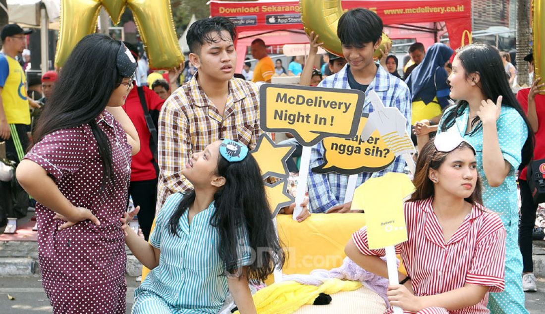 Model saat mengkampanyekan program McDelivery Night In, Jakarta, Minggu (15/9). Program ini memberikan banyak hadiah dan promosi yang berlaku tanggal (19/9) pukul 17.00 sampai (20/9) pukul 04.59 sebagai apresiasi kepada konsumen setia. - JPNN.com