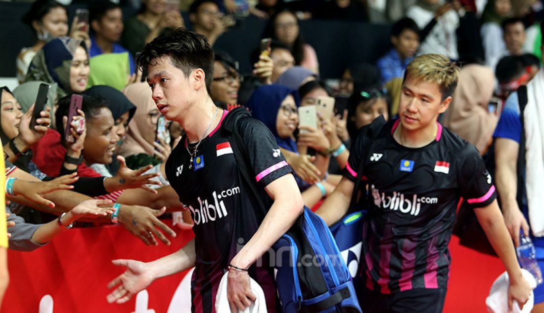 Ganda putra Indonesia Marcus Fernaldi Gideon dan Kevin Sanjaya Sukamuljo saat bertanding pada turnamen Indonesia Masters 2020, Jakarta, Kamis (16/1). Polii dan Apriyani menang atas lawannya dengan skor 21-19 dan 21-13. - JPNN.com