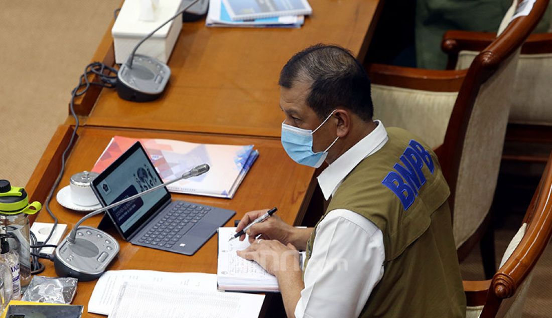 Kepala BNPB selaku Ketua Gugus Tugas Nasional Percepatan Penanganan COVID-19 Doni Monardo mengikuti rapat kerja dengan Komisi VIII DPR, Jakarta, Senin (13/7). Rapat kerja tersebut membahas evaluasi kinerja dan anggaran program penangulangan COVID-19. - JPNN.com