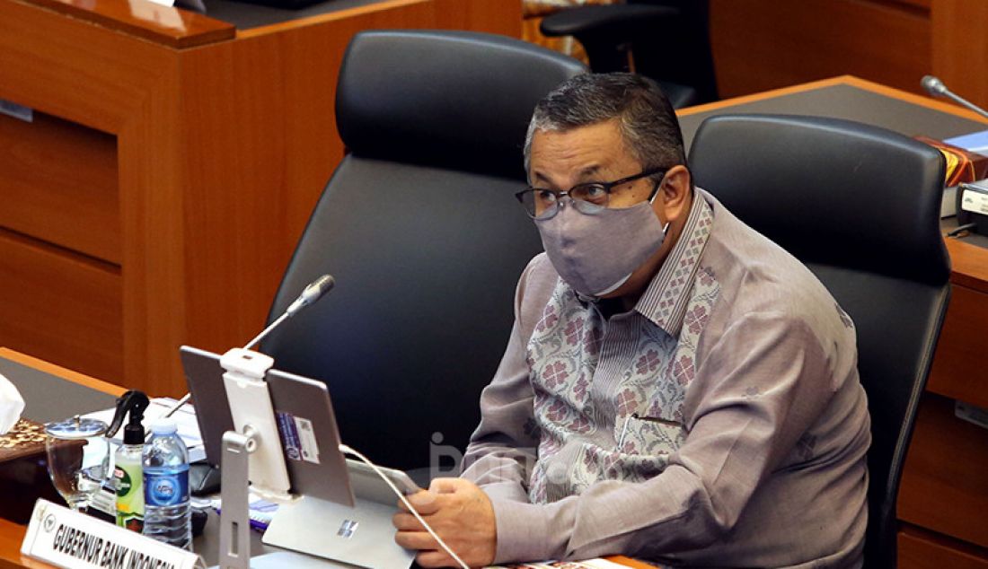 Gubernur Bank Indonesia Perry Warjiyo saat rapat kerja dengan Banggar DPR, Jakarta, Senin (31/5). Rapat tersebut membahas RAPBN TA 2022 dan RKP 2022. - JPNN.com