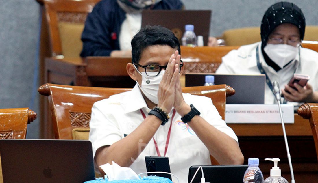 Menteri Pariwisata dan Ekonomi Kreatif (Menparekraf) Sandiaga Uno menghadiri rapat kerja Komisi X DPR di Kompleks Parlemen Senayan, Jakarta, Senin (14/6). Rapat tersebut membahas RKA K/L dan RKP K/L Kemenparekraf Tahun 2022. - JPNN.com