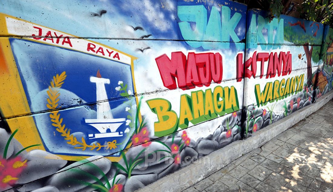 Mural yang ada di Taman Betawi Ngumpul, Jakarta, Jumat (27/8). Belakangan seni lukis mural menjadi viral. - JPNN.com