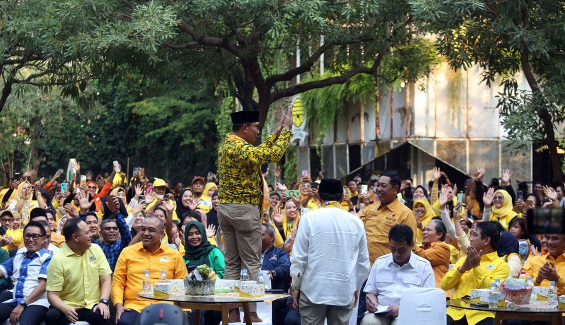 Bakal paslon Gubernur dan Wakil Gubernur DKI Jakarta Ridwan Kamil-Suswono (RIDO) saat acara Apel Pemenangan Ridwan Kamil - Suswono (RIDO) di Halaman kantor Golkar DKI Jakarta, Jakarta, Sabtu (21/9). - JPNN.com