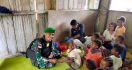 Cegah Penyakit Filariasis, Satgas Yonif 126/Kala Cakti Periksa Kesehatan Anak Papua - JPNN.com
