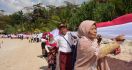 Pupuk Indonesia Bersama Relawan Bakti BUMN Bentangkan Bendera Merah Putih Sepanjang 1 KM - JPNN.com