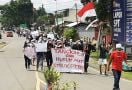 Ratusan Massa Desak Kapolda Sulut Tangkap Aktor Intelektual Tewasnya Warga Desa Toruakat - JPNN.com